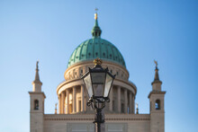 Germany, Brandenburg, Potsdam, Old-fashioned Street Lamp Against Dome Of Saint Nicholas Church