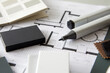 © Rainer Berg/Westend61 - Felt tip pens and material swatches lying on architecturalÔøΩblueprint