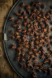 © Achim Sass/Westend61 - Star anise on rustic baking sheet