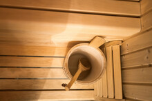 Bucket And Wooden Spoon In Sauna