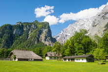 Germany, Bavaria, Upper Bavaria, Berchtesgaden Alps, Berchtesgaden National Park, Mount Watzmann Behind Farm Houses