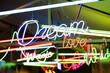 © Westend61 - Colorful neon signs glowing indoors