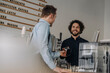 © KNSY/Westend61 - Customer paying contactless in a coffee shop