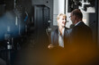 © BELLEVUE/Westend61 - Businessman and businesswoman with tablet talking in a factory