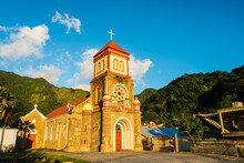Low Angle View Of Anglican Church Against Blue Sky In Soufriere, Dominica, Caribbean