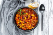 © Sandra Roesch/Westend61 - Overhead view of bowl of vegetarian chili con carne