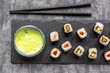 © Sandra Roesch/Westend61 - Sushi on slabe plate, wasabi in bowl, chop sticks