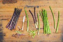 Kitchen Knife And Fresh Asparagus Stalks