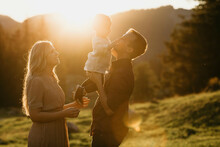 Happy Family With Little Son On A Hiking Trip At Sunset, Schwaegalp, Nesslau, Switzerland