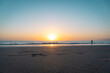 © Oliver Marquardt/Westend61 - USA, California, Los Angeles, Clear sky over sandy coastal beach of Pacific Ocean at sunset