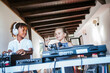 © DREAMSTOCK1982/Westend61 - Smiling boy and girl djaying at the turntable