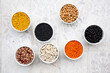 © Larissa Veronesi/Westend61 - Various legumes in bowls: chickpeas, cannellini beans, quail beans, black beans, yellow lentils, red lentils, black lentils