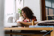 © Westend61 - Woman sewing at home