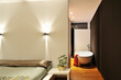 © Manu Prats/Westend61 - Bathroom and part of bedroom in modern home