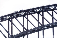 Silhouette People Climbing Sydney Bridge Against Clear Sky, Australia