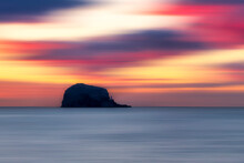 UK, Scotland, Firth Of Forth At Moody Sunrise With Silhouette Of Bass Rock In Background