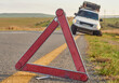 © Westend61 - Safety triangle warning of a car accident on the side of the road, South Africa