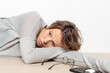 © Vladimir Godnik/Westend61 - Portrait of sad young woman lying on the floor