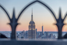 Skyline At Sunset With Empire State Building In Foreground And One World Trade Center In Background, Manhattan, New York City, USA