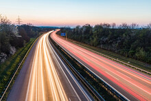 Germany, Baden-Wuerttemberg, Traffic Light Trails On Autobahn A8 At Dusk
