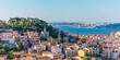 © Werner Dieterich/Westend61 - Castelo Sao Jorge and cityscape against clear sky at Lisbon, Portugal