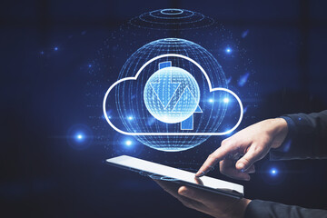 Leinwandbilder - Businessman hand pointing at tablet with abstract digital globe with cloud and arrows. Cloud computing and upload concept.