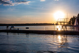 Fototapeta Pomosty - giżycko jezioro słońce zachód słońca wschód słońca pomost mostek plaża giżycko jezioro słońce zachód słońca wschód słońca pomost mostek plaża warmia mazury