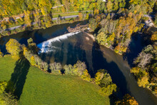 Aerial View Of Weir On River Loisach In Autumn