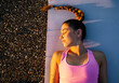 © Marco Govel/Westend61 - Young woman with eyes closed meditating while lying on mat at sunset