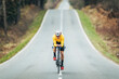 © Mikel Taboada Blanco/Westend61 - Young sportsperson cycling on road