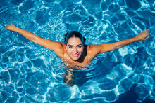 Smiling Woman In Swimming Pool