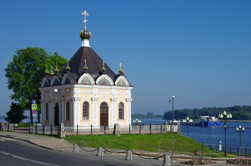 Canvas Print - Rybinsk, Russia - May, 2021: View of the Nikolskaya chapel on the Volzhskaya embankment