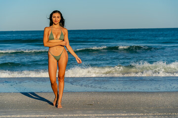 Lovely Mixed Race Bikini Model Posing Outdoors On A Caribbean Beach