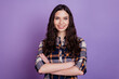 © Tetiana - Portrait of nice good attractive girl holding arms crossed looking at camera confident isolated on violet background
