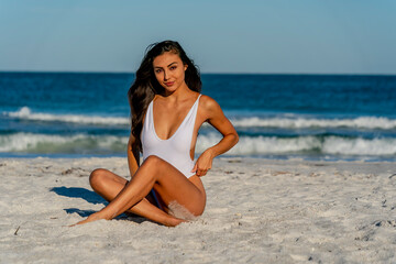 Lovely Mixed Race Bikini Model Posing Outdoors On A Caribbean Beach