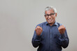 © AJay - Smiling senior  man of Indian origin with a cheering expression