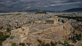 Aerial drone photo of Masterpiece Acropolis hill and the Parthenon on a beautiful cloudy morning, Athens, Attica, Greece