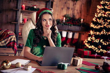 Sticker - Photo of think millennial brunette lady write laptop wear green costume at home on holiday