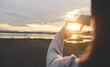 Close up of woman hands making frame gesture with sunset on sky, Female capturing the sunrise, sunlight outdoor,Future planning,