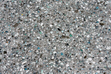 Full Frame View Of A Terrazzo Surface Made With Broken Tiny Pieces Of Turquoise And Black Colored Glass