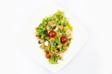 Wall Mural - Closeup of a fresh salad with various types of vegetables on a white background