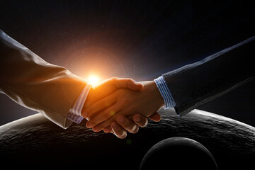 Wall Mural - Partnership concept. Image of handshake