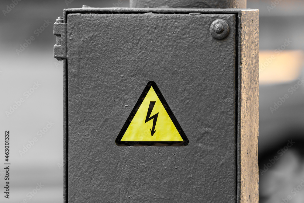 Electrical hazard sign on a junction box Stock Photo | Adobe Stock