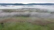 Drohnenaufnahme, Agrarlandschaft  im Spessart mit Wolken und Nebel