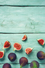 Wall Mural - fresh figs on wooden surface