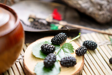 Wall Mural - Ripe large black mulberries close up