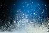 Fototapeta Nowy Jork - explosion of flour and components, lifting them into the air on a white surface