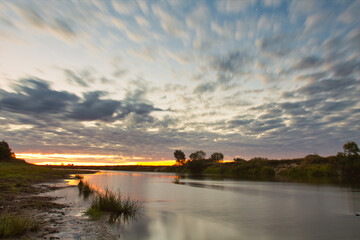 Wall Mural - beautiful red pink dawn by the river