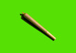 © Mar FernÁndez Navarro/Wirestock - Therapeutic medical cannabis joint isolated on a green background