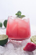 © ADDICTIVE STOCK - Coconut water with lime and strawberries